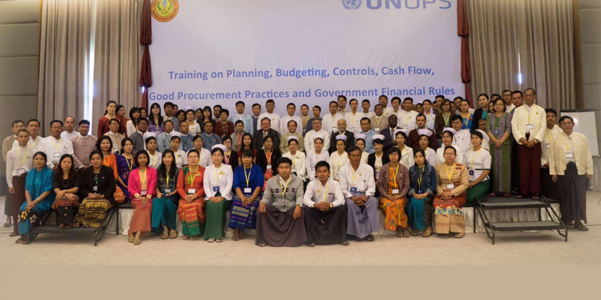 Union Minister for Health and Sports H.E. Dr Myint Htwe with officials from the Ministry of Health and Sports, UNOPS and participating government health staff from across the country, after the opening session of the third batch of training, Nay Pyi Taw, 6 November 2017. Union Minister for Health and Sports H.E. Dr Myint Htwe with officials from the Ministry of Health and Sports, UNOPS and participating government health staff from across the country, after the opening session of the third batch of training, Nay Pyi Taw, 6 November 2017.