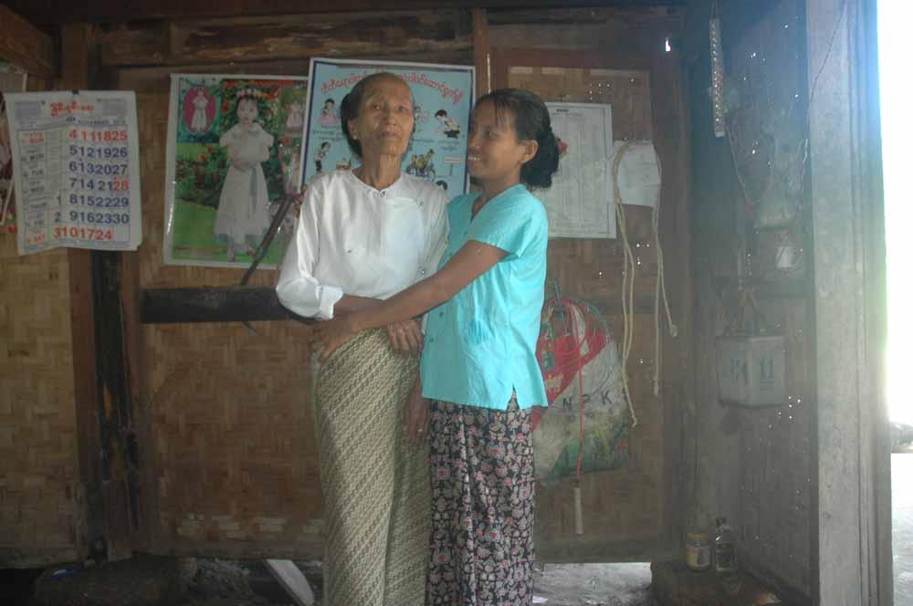 Joyful Ma Thida together with her mother at their home in Ma Gyee Pin Su village, Meiktilar township. Photo: MHAA