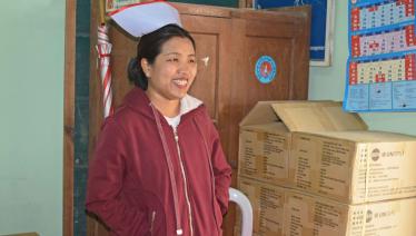 Trained Nurse Kim Hua Hau of the National AIDS Programme (NAP), Hakha Township, Chin State, which is situated in the remote western corner of Myanmar. People there have limited access to quality healthcare services due to the remoteness of the place and their low income status. Global Fund supported programmes are providing HIV, TB and malaria prevention, treatment and control services to many vulnerable people in remote rural parts of Chin State, including Hakha Township. Photo: UNOPS