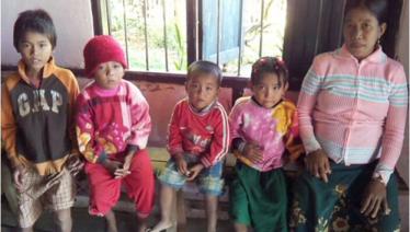 A thankful mother and her four children during MMA malaria fixed clinic in Ann Township,Rakhine State. Photo: MMA