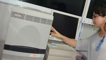 A PCR machine installed with Global Fund support at the Magway General Hospital. The quality of ART services is improved with more patients having access to viral load testing.